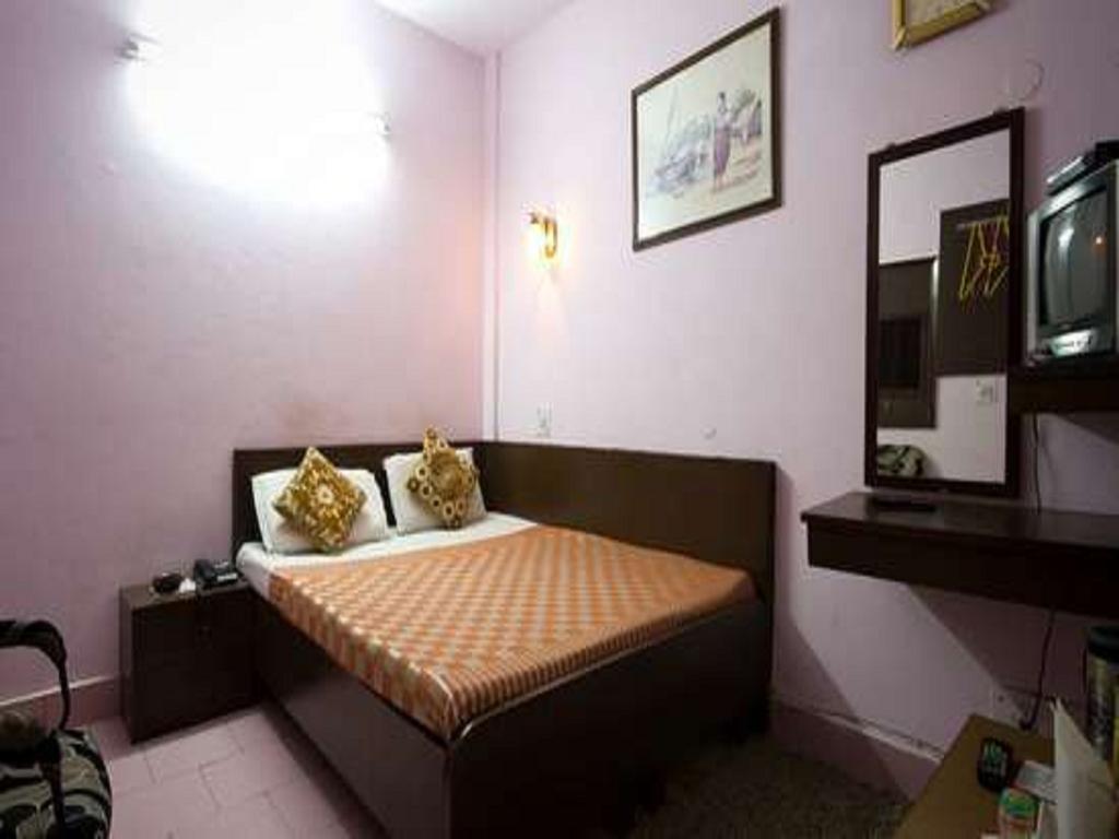 Hotel Woodland Deluxe Neu-Delhi Zimmer foto