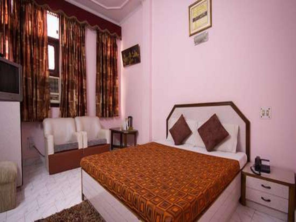 Hotel Woodland Deluxe Neu-Delhi Zimmer foto